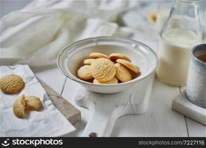 Butter cookies on the wooden table.