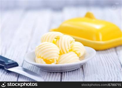 butter on plate and on a table
