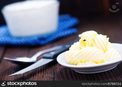 butter on plate and on a table