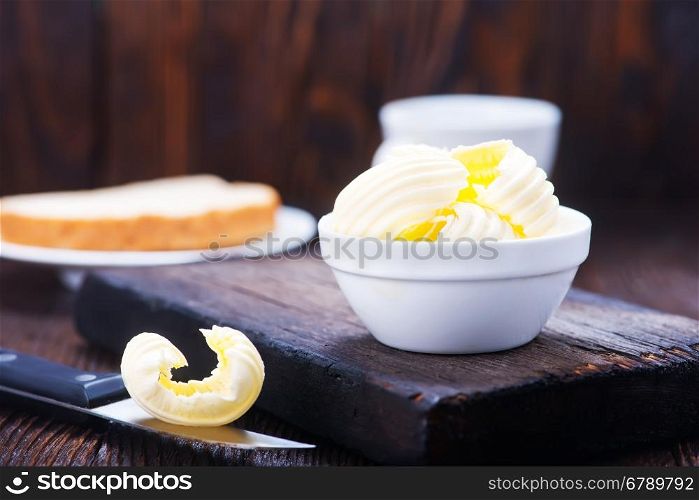 butter on plate and on a table