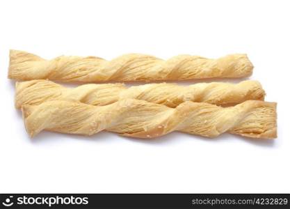 Butter salted twists closeup on white background