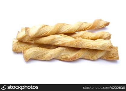 Butter salted twists closeup on white background