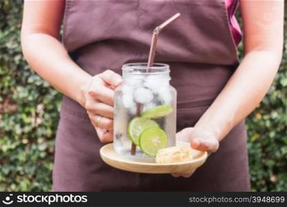 Butter scone and lime Infused detox water, stock photo