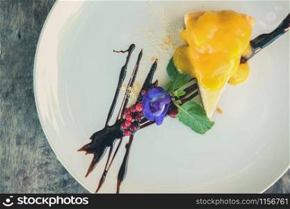 butterfly pea flower cheese cake mint leaves & chocolate sauce