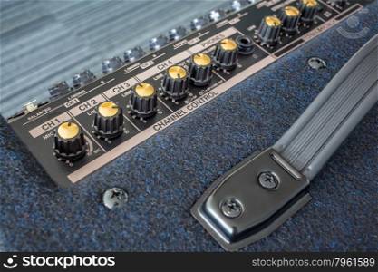 Button of Keyboard Power Amplifier, closeup view background