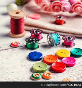 Buttons of different colors and accessories for needlework. Set of colored buttons