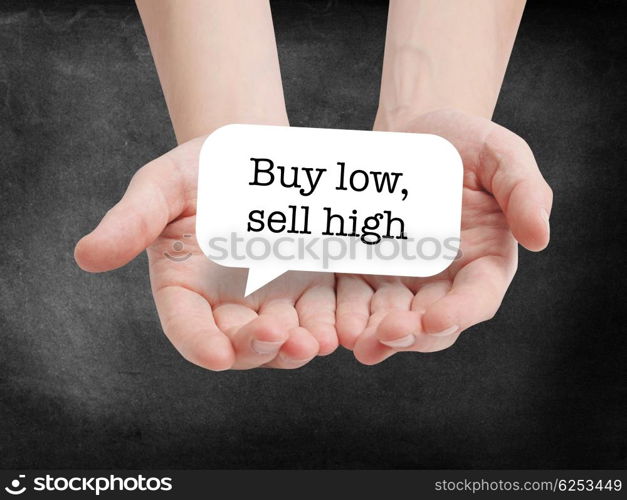 Buy low sell high written on a speechbubble