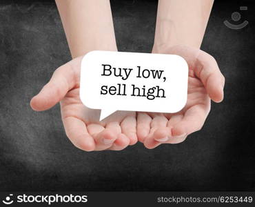 Buy low sell high written on a speechbubble