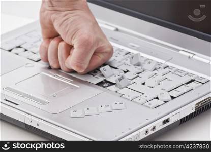 "By hand damaged laptop on white background with "help" word "