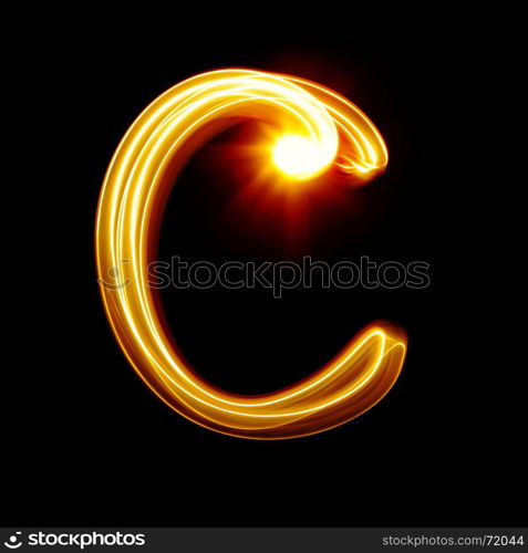 C - Created by light alphabet over black background