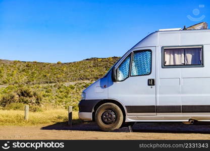 C&ervan with internal thermal screen blind at window pane. C&ing on nature. Holidays and travel in motor home.. C&ervan with thermal screen blind