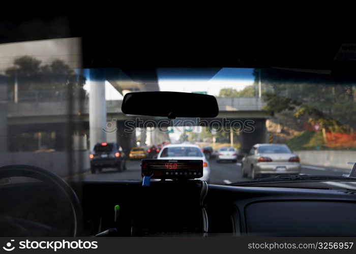 Cab meter on the dashboard of a car