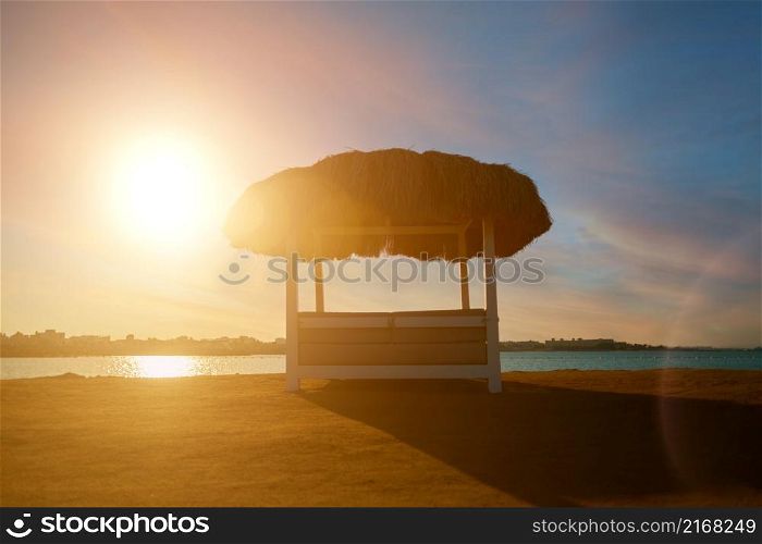 Cabana on a sandy beach on colourful evening at Red Sea.. Cabana on a sandy beach on colourful evening at Red Sea