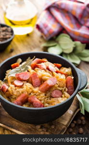 Cabbage braised with sausages, sauerkraut. German cuisine.