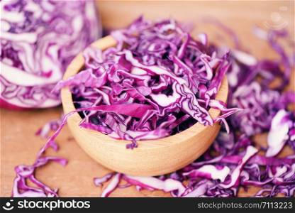 Cabbage purple / Shredded red cabbage slice in a wooden bowl top view