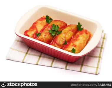 cabbage rolls stuffed with ground beef and rice with sour cream in a baking dish. High quality photo. cabbage rolls stuffed with ground beef and rice with sour cream in a baking dish
