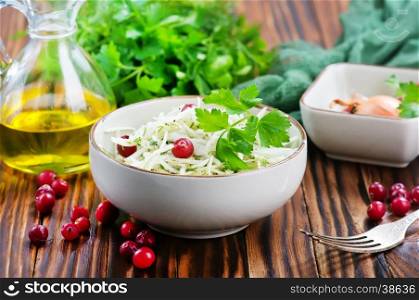 cabbage salad in bowl and on a table