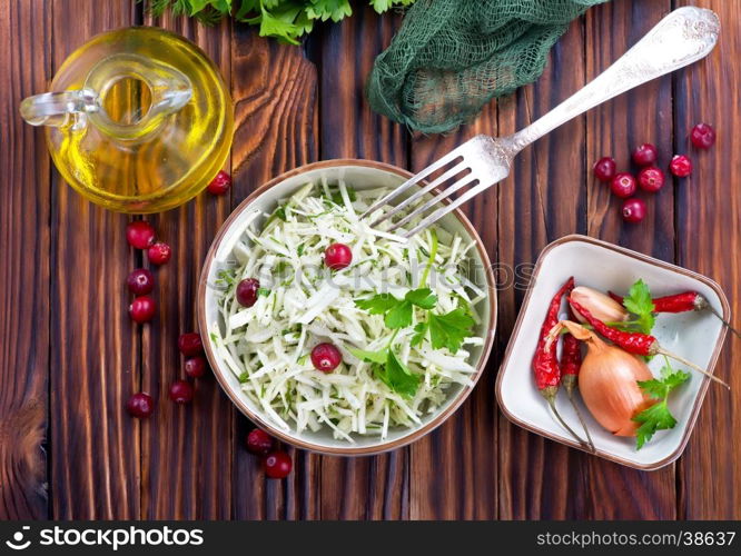 cabbage salad in bowl and on a table