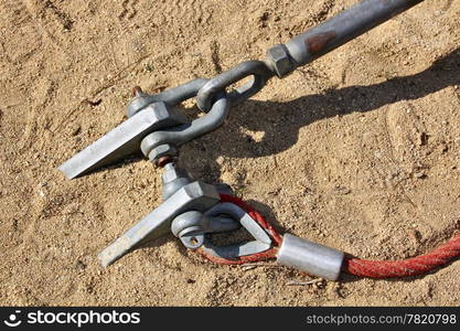 cable anchors into the ground