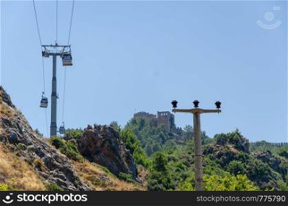 Cable car carrying tourists from city to Alanya castle