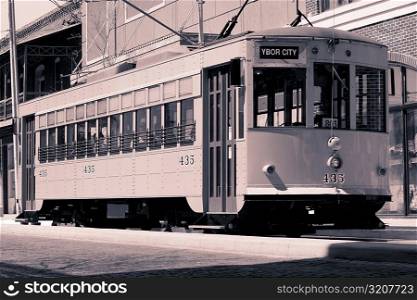 Cable car in front of a building, Ybor City, Tampa, Florida, USA