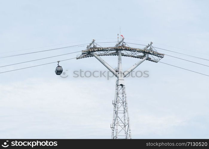 Cable car on wire. transport over island transit. Cloud backgruond in season summer.