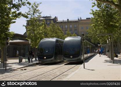 Cable cars on tracks, Quinconces Tram Station, Place des Quinconces, Bordeaux, France