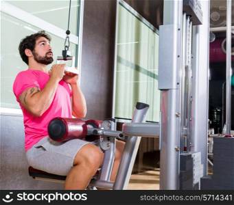 Cable Lat pulldown machine man workout at gym exercise