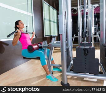 Cable Lat pulldown machine woman workout at gym exercise