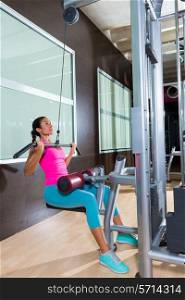 Cable Lat pulldown machine woman workout at gym exercise