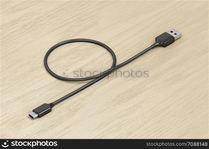 Cable usb-a to usb-c on wood table