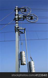 Cables and pole tower, electric train railway