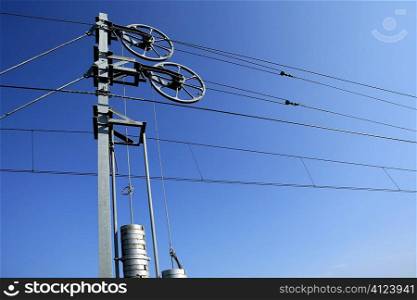 Cables and pole tower, electric train railway