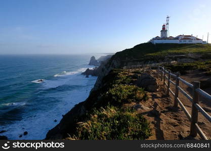 Cabo da Roca lighthouse at big rocky cliffs, Portugal