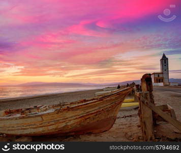 Cabo de Gata in Almeria at San Miguel Beach and Salinas church with stranded boats