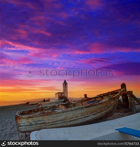 Cabo de Gata in Almeria at San Miguel Beach and Salinas church with stranded boats