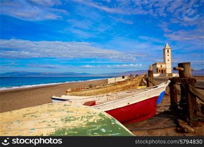 Cabo de Gata in Almeria at San Miguel Beach and Salinas church with stranded boats