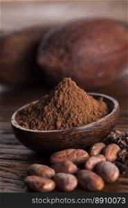 Cacao beans and powder and food dessert background. Cocoa beans in the dry cocoa pod fruit on wooden background
