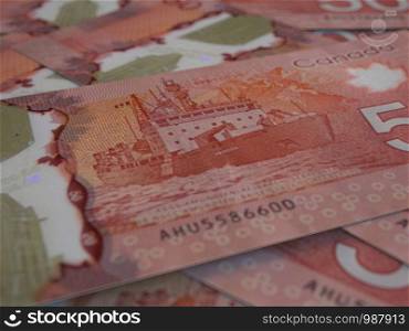 CAD. Canadian currency background. Closeup photo. Dollars of Canada. CAD. Canadian currency background. Closeup photo