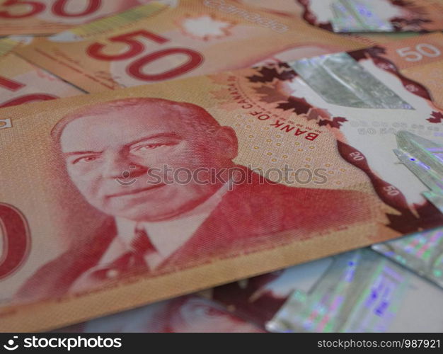 CAD. Canadian currency background. Closeup photo. Dollars of Canada. CAD. Canadian currency background. Closeup photo