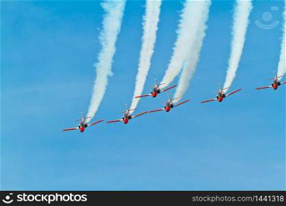 CADIZ, SPAIN-SEP 11: Aircrafts of the Patrulla Aguila taking part in an exhibition on the 4th airshow of Cadiz on Sep 11, 2011, in Cadiz, Spain. Patrulla Aguila