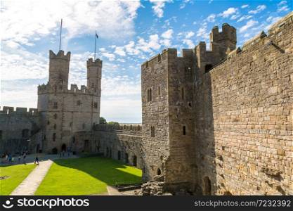 Caernarfon Castle in Wales in a beautiful summer day, United Kingdom