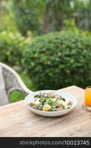 caesar salad appetizer on wooden background