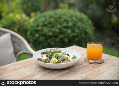 caesar salad appetizer on wooden background