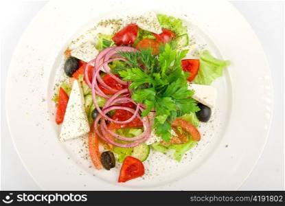 Caesar salad dish close up on a white background