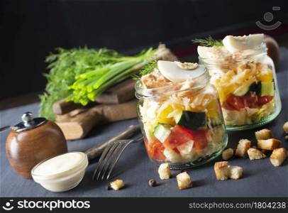 caesar salad in glass bank, fresh salad with chicken
