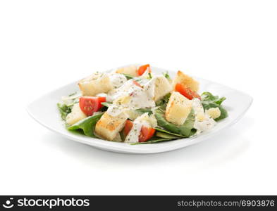 caesar salad in plate isolated on white background