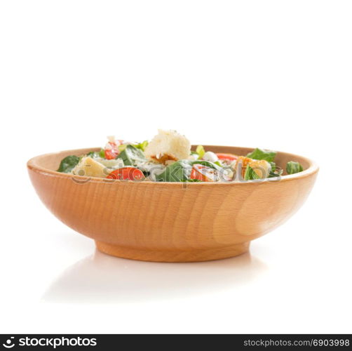 caesar salad in plate isolated on white background