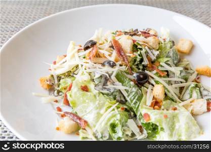 Caesar salad with bacon and chicken, mediterranean cuisine