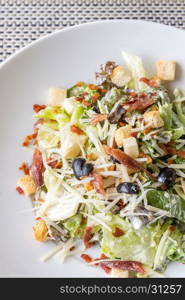 Caesar salad with bacon and chicken, mediterranean cuisine